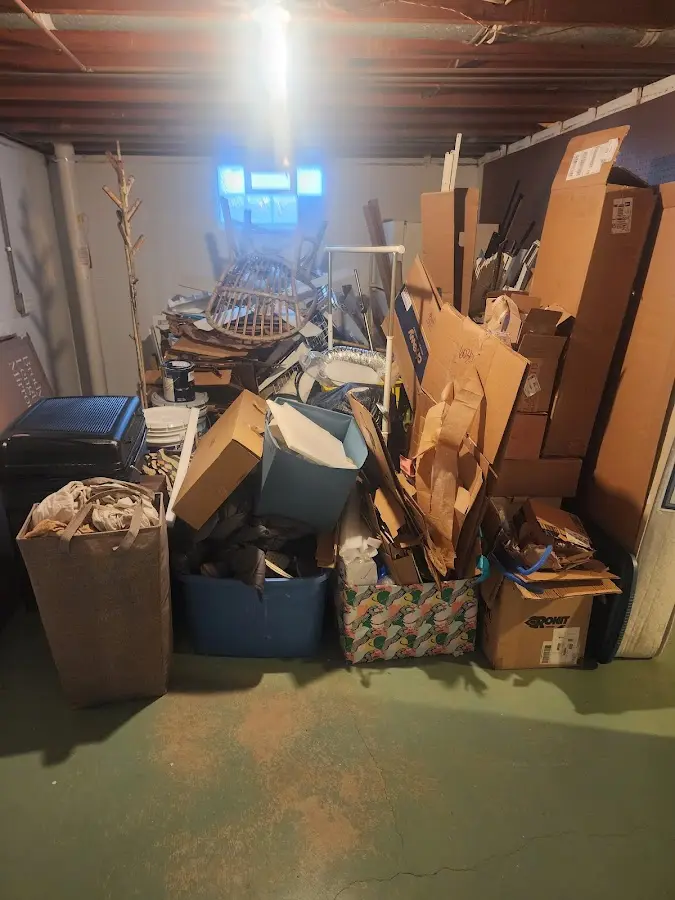 Roll-off dumpster container at job site for Yard Waste Dumpster Rental in Ravenswood